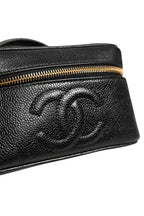 Chanel Black and gold makeup bag